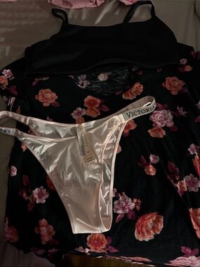 Victoria's Secret pink sparkle Panties with a flower shirt and black bra too